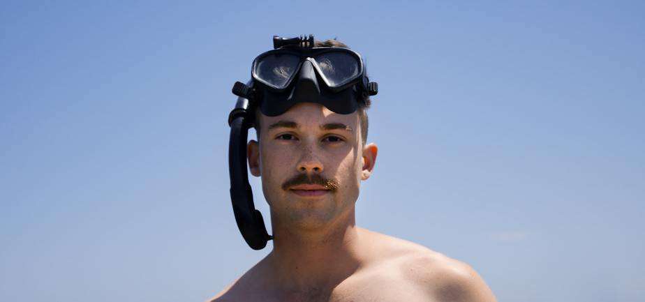 snorkeler with a mustache