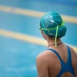 how to put on a swim cap with long short hair