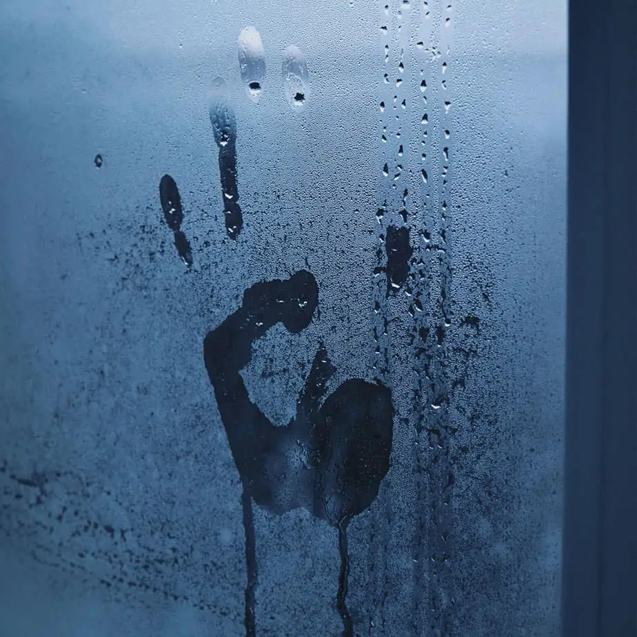 handprint on foggy window