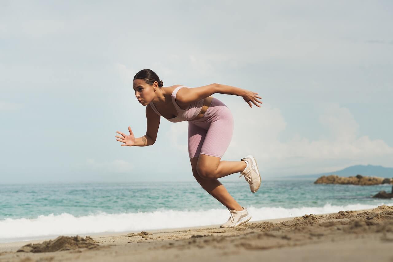 fatigued runner by the beach