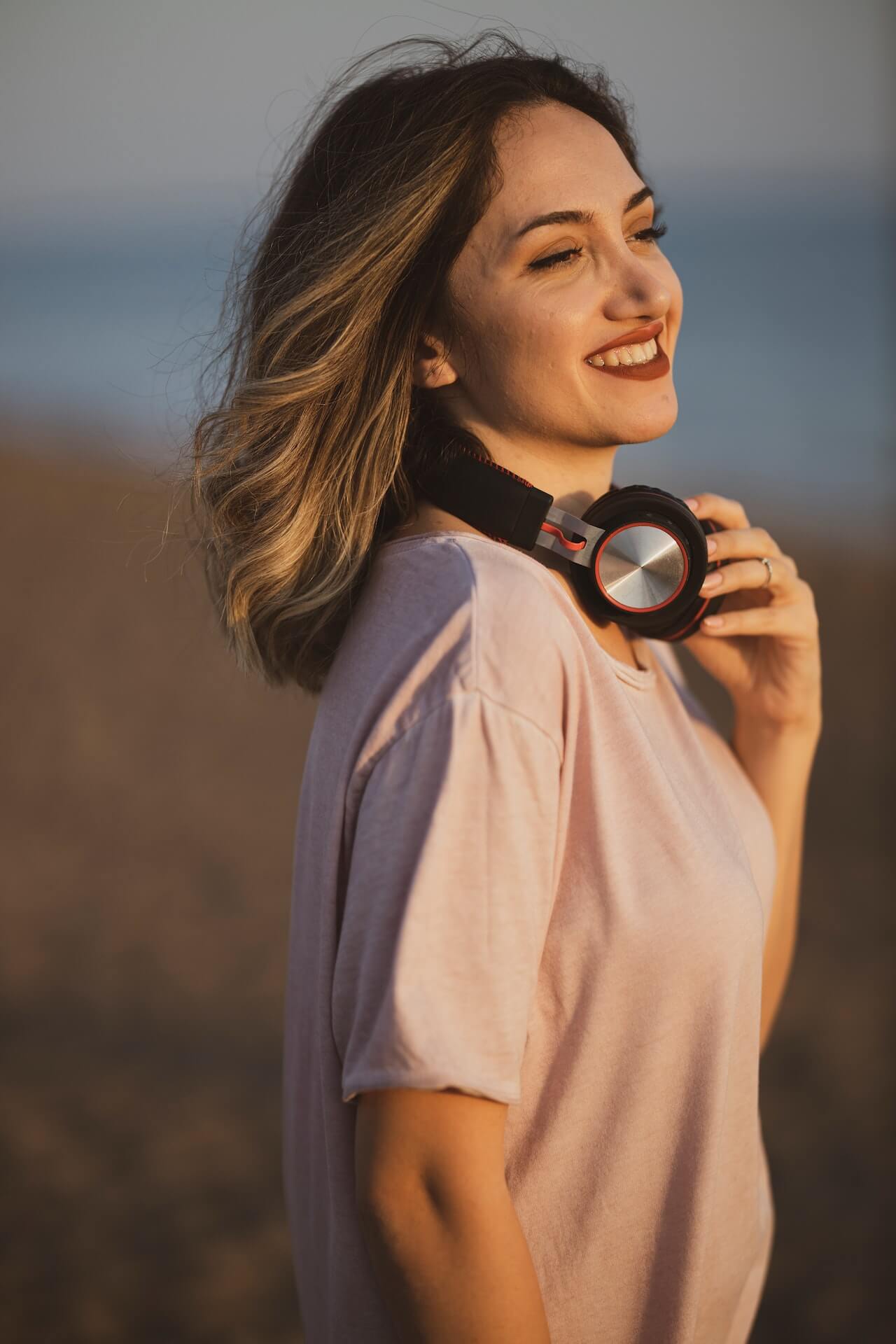 beach headphone listening to music