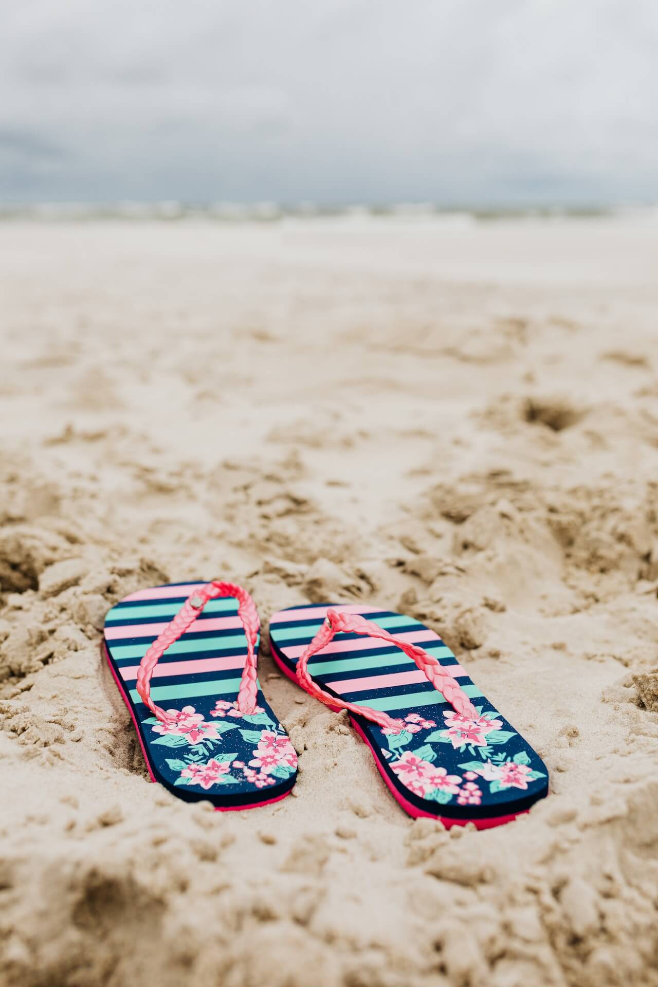 flower flip flip sandals on the sand