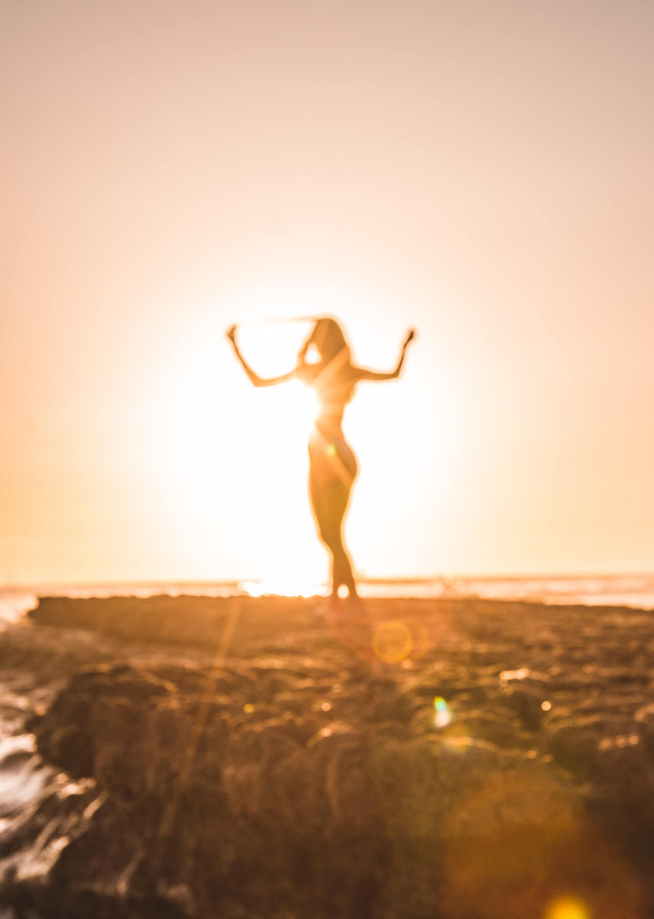 woman out of focus clothed in sunlight