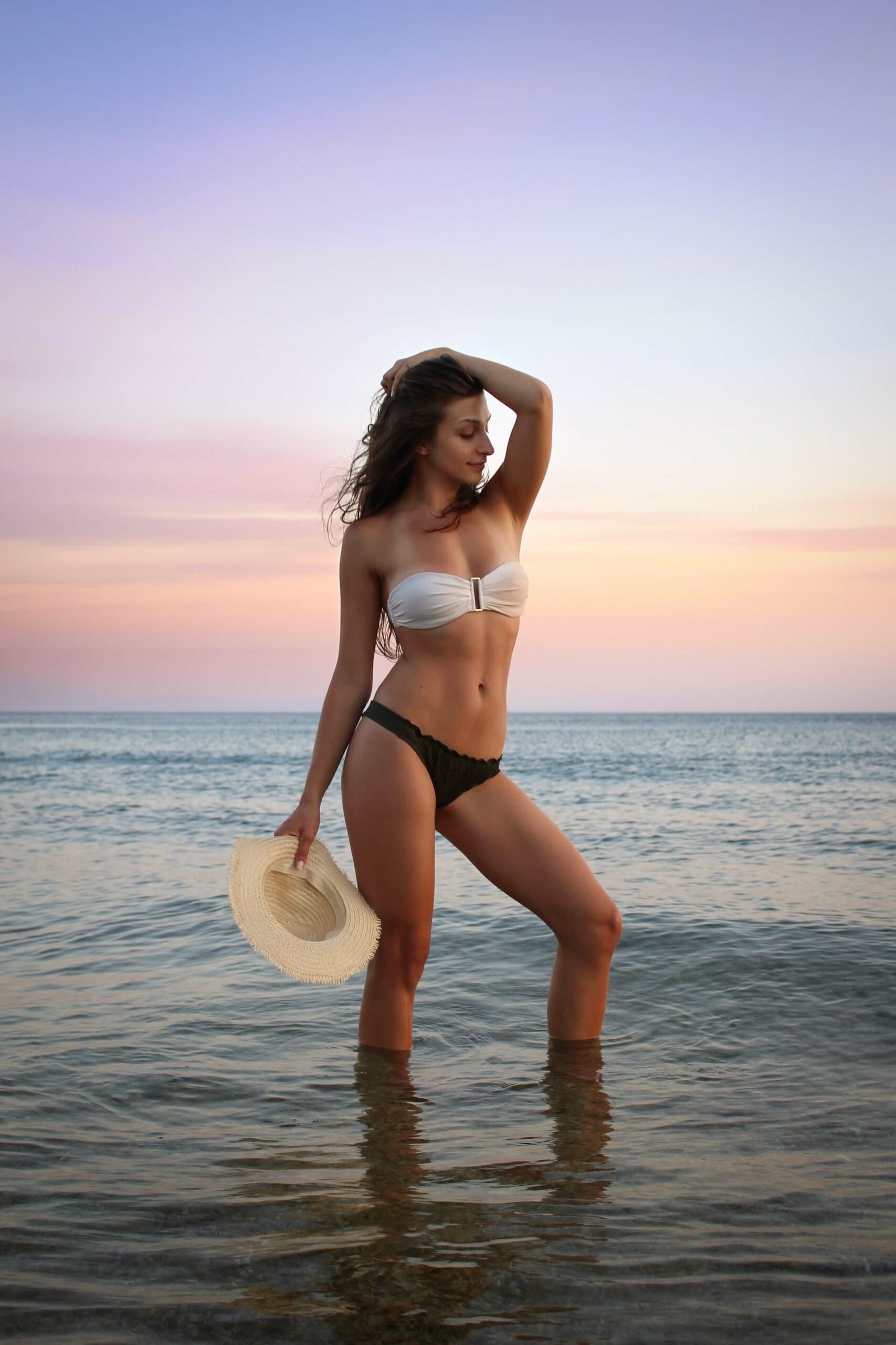 bikini girl standing in water