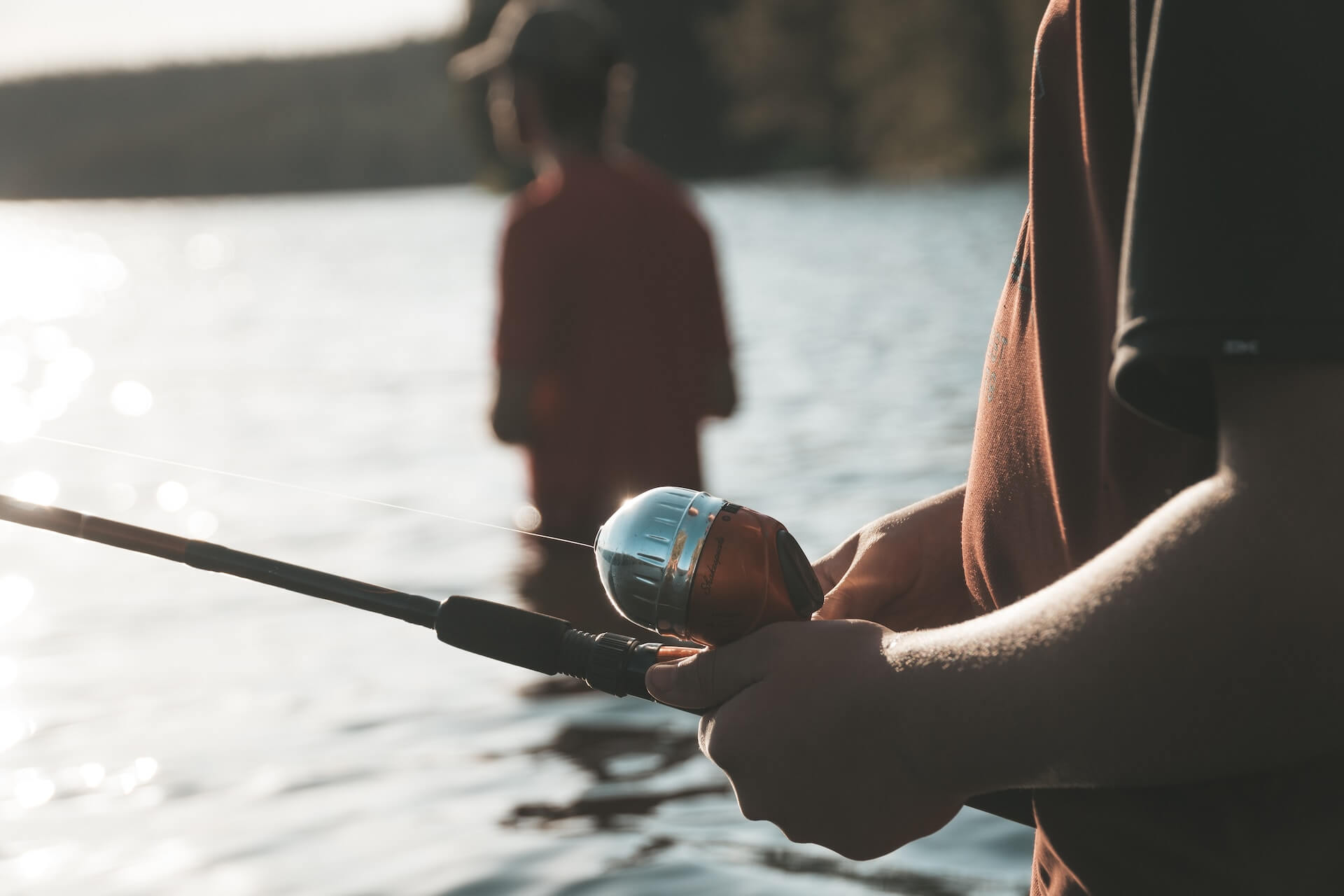 two guys fishing at the lake